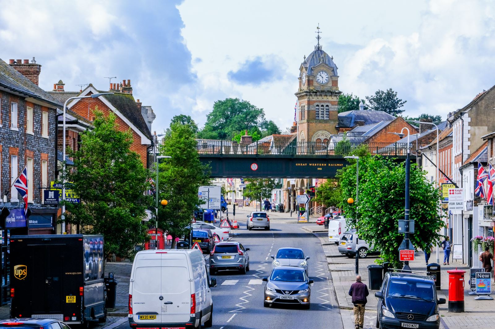 Hungerford, high street with traffic and bridge 